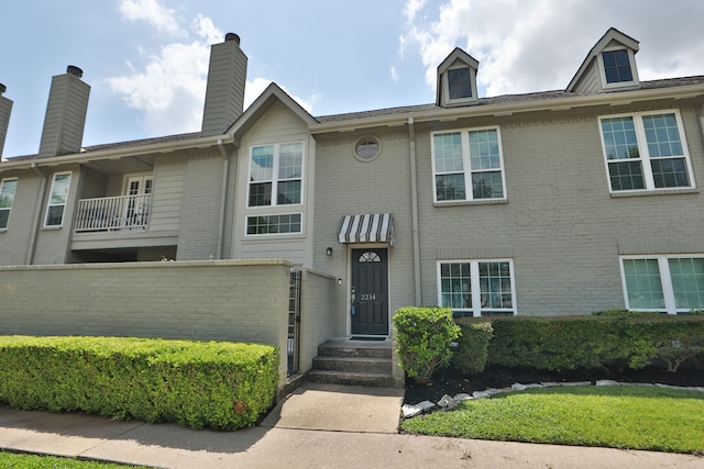 2214 Hopkins St Unit 2214, Houston, TX 77006 - view of property featuring brick siding