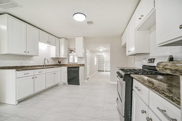 538 Pecan Dr, South Houston, TX 77587 - kitchen featuring stainless steel gas stove, dishwasher, tasteful backsplash, baseboards, and light marble finish flooring