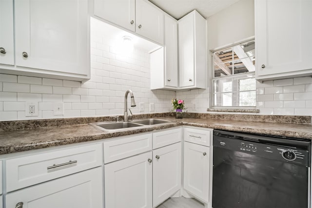 538 Pecan Dr, South Houston, TX 77587 - kitchen with black dishwasher, a sink, backsplash, and white cabinetry