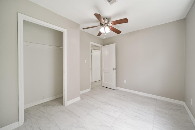 538 Pecan Dr, South Houston, TX 77587 - unfurnished bedroom featuring a closet, ceiling fan, baseboards, and light marble finish flooring