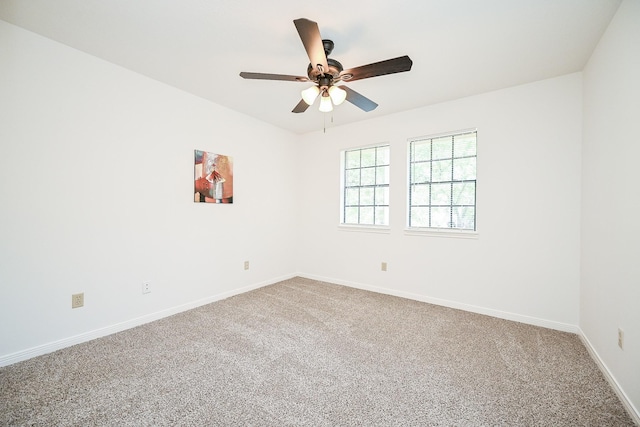 31 Silent Brook Pl, The Woodlands, TX 77381 - carpeted spare room with baseboards and a ceiling fan