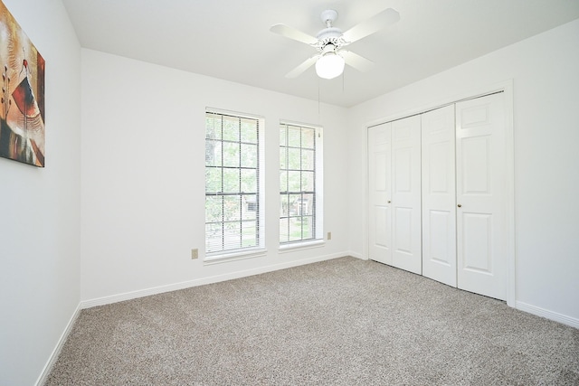 31 Silent Brook Pl, The Woodlands, TX 77381 - unfurnished bedroom featuring carpet flooring, baseboards, and a closet