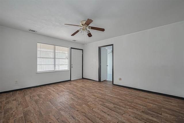 423 Gammon Dr, Houston, TX 77022 - empty room featuring wood finished floors, a ceiling fan, and baseboards