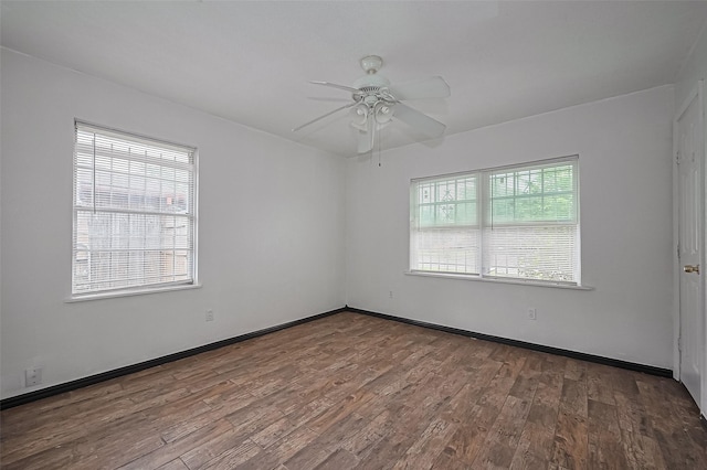 423 Gammon Dr, Houston, TX 77022 - empty room featuring wood finished floors, ceiling fan, and baseboards