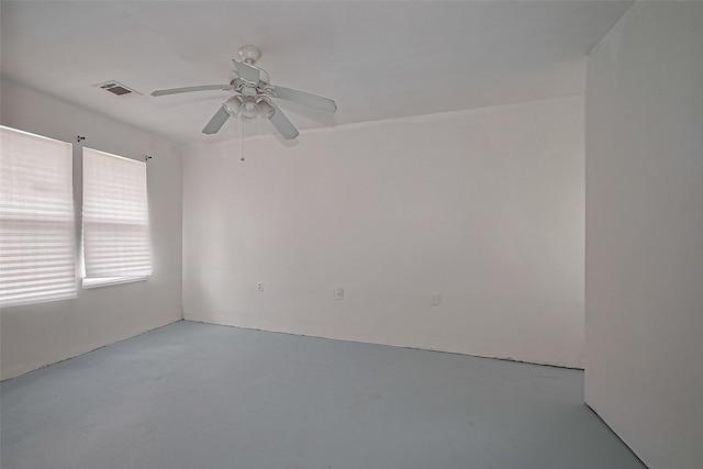 423 Gammon Dr, Houston, TX 77022 - spare room with a ceiling fan and concrete flooring