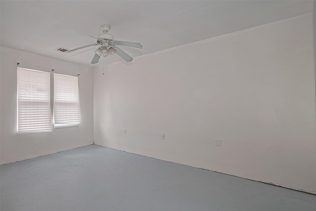 423 Gammon Dr, Houston, TX 77022 - empty room with ceiling fan and concrete flooring