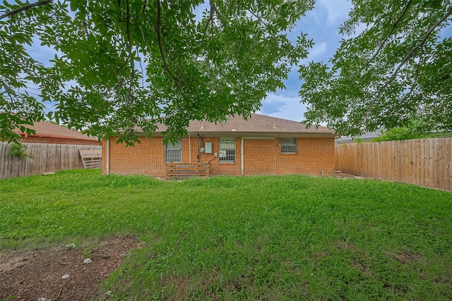 423 Gammon Dr, Houston, TX 77022 - back of property featuring brick siding