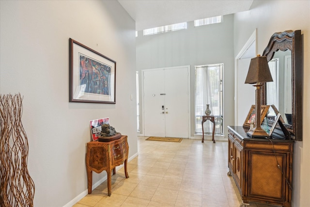 12007 Lakeway Ct, Houston, TX 77071 - entryway with a towering ceiling and baseboards