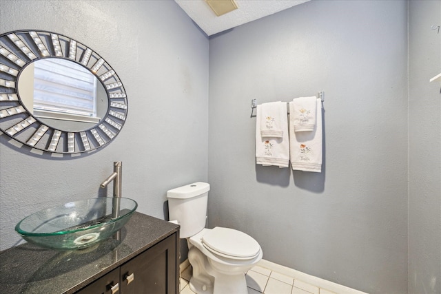12007 Lakeway Ct, Houston, TX 77071 - half bathroom with toilet, tile patterned floors, vanity, and baseboards