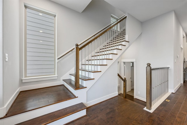727 Schwartz St, Houston, TX 77020 - stairway featuring hardwood / wood-style flooring and baseboards