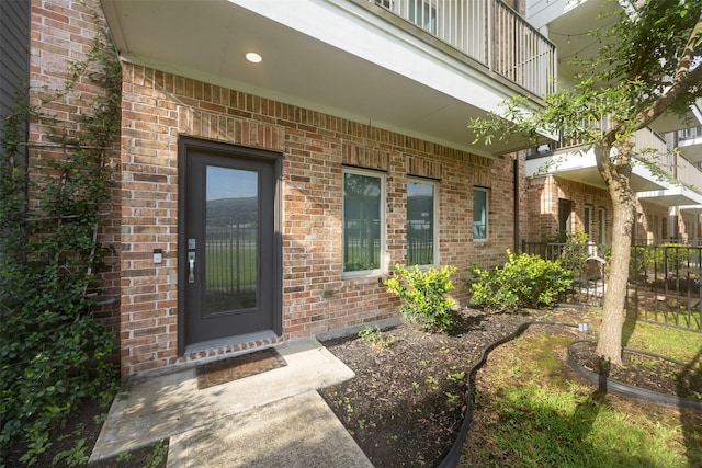 727 Schwartz St, Houston, TX 77020 - doorway to property featuring brick siding