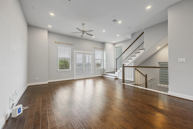 727 Schwartz St, Houston, TX 77020 - unfurnished living room featuring a ceiling fan, wood-type flooring, baseboards, recessed lighting, and stairs