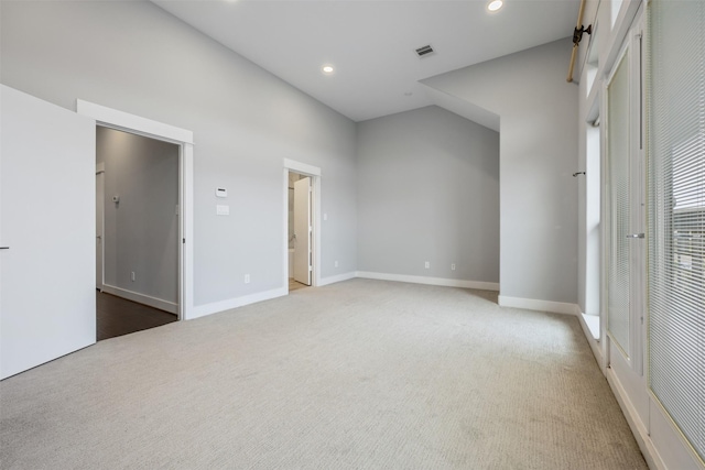 727 Schwartz St, Houston, TX 77020 - unfurnished bedroom featuring carpet flooring, recessed lighting, baseboards, and lofted ceiling