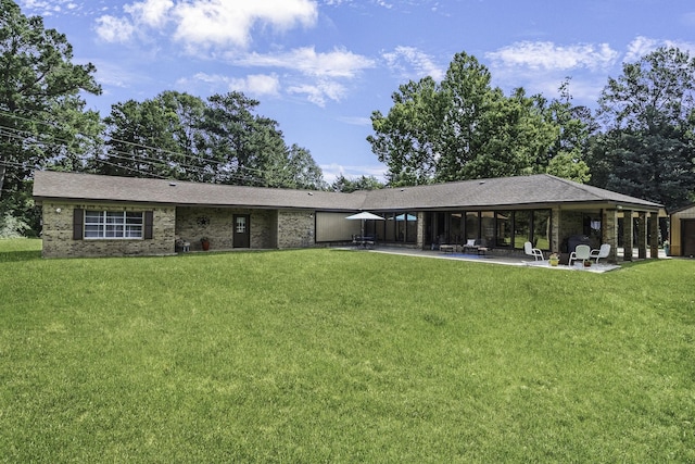 6462 US Highway 190 E, Livingston, TX 77351 - back of house with a patio and a yard