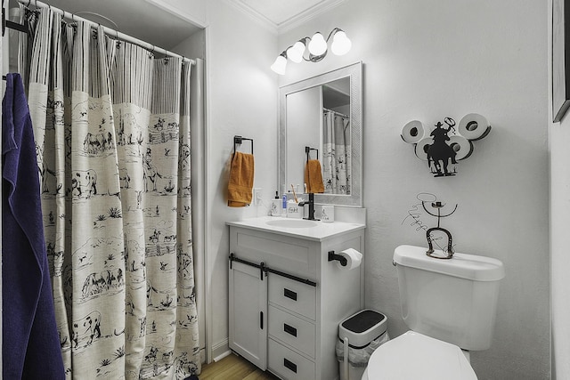 6462 US Highway 190 E, Livingston, TX 77351 - bathroom with crown molding, vanity, toilet, curtained shower, and wood finished floors