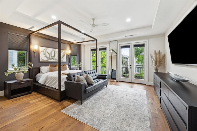 540 W 26th St Unit B, Houston, TX 77008 - bedroom featuring french doors, access to outside, a raised ceiling, light wood finished floors, and baseboards
