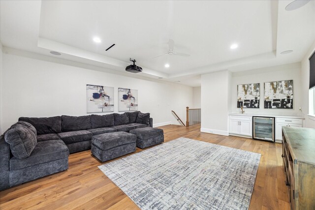 540 W 26th St Unit B, Houston, TX 77008 - living area with a raised ceiling, wine cooler, bar area, light wood-style flooring, and recessed lighting