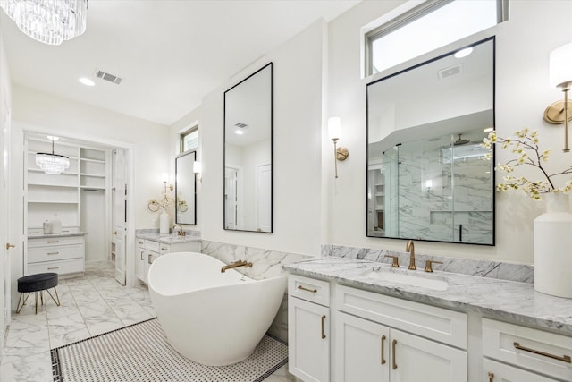 540 W 26th St Unit B, Houston, TX 77008 - bathroom with a marble finish shower, marble finish floors, a soaking tub, vanity, and wainscoting