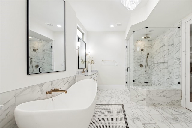 540 W 26th St Unit B, Houston, TX 77008 - full bath with a marble finish shower, a freestanding tub, marble finish flooring, vanity, and recessed lighting