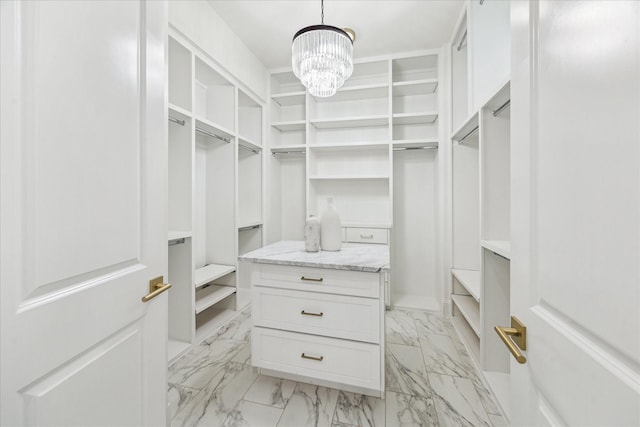 540 W 26th St Unit B, Houston, TX 77008 - spacious closet featuring light marble finish floors and a chandelier