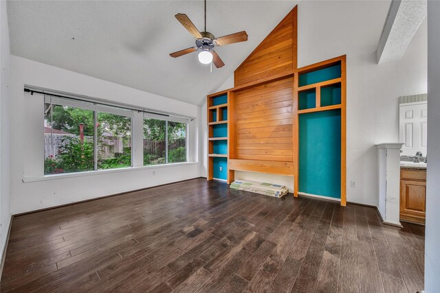 4214 Hambledon Village Dr, Houston, TX 77014 - unfurnished living room featuring ceiling fan, dark wood finished floors, a sink, and high vaulted ceiling