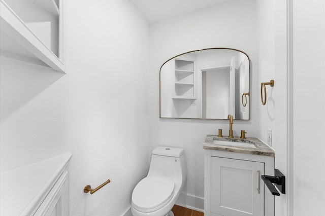 1100 S Shepherd Dr, Houston, TX 77019 - half bath featuring vanity and wood finished floors