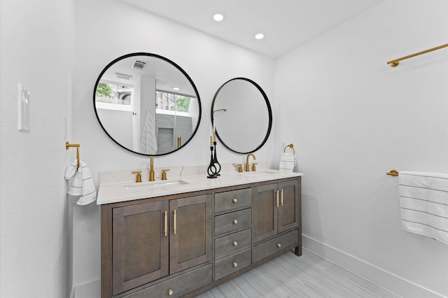 1100 S Shepherd Dr, Houston, TX 77019 - bathroom with double vanity and recessed lighting