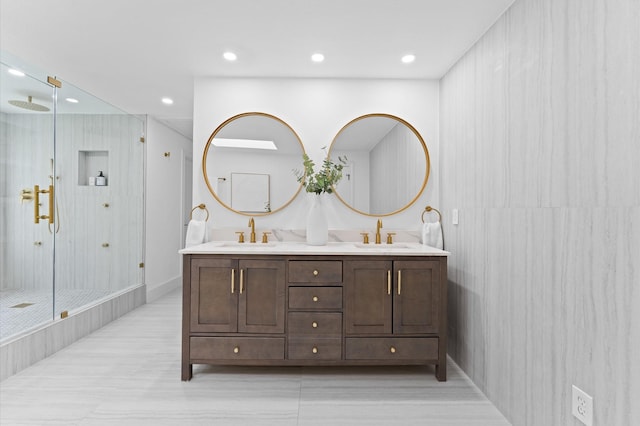 1100 S Shepherd Dr, Houston, TX 77019 - full bath with double vanity, a shower stall, recessed lighting, and tile patterned flooring