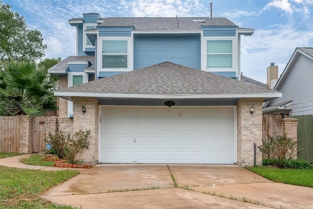 12419 Truesdell Dr, Houston, TX 77071 - view of front of house featuring a shingled roof, concrete driveway, and a garage