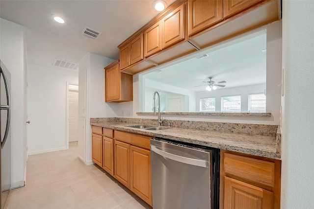 12419 Truesdell Dr, Houston, TX 77071 - kitchen with stainless steel dishwasher, a sink, a ceiling fan, light tile patterned floors, and recessed lighting