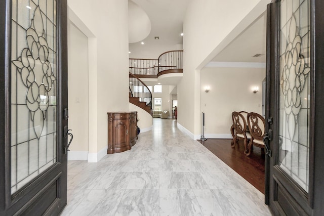 18111 Dockside Landing Dr, Cypress, TX 77433 - entrance foyer featuring baseboards, stairway, and crown molding