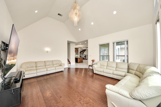 18111 Dockside Landing Dr, Cypress, TX 77433 - living room with stairs, wood finished floors, recessed lighting, and high vaulted ceiling