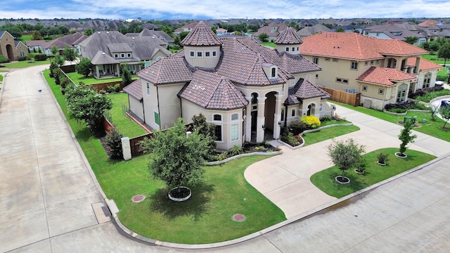 18111 Dockside Landing Dr, Cypress, TX 77433 - view of front of property featuring curved driveway, a residential view, stucco siding, and a tiled roof