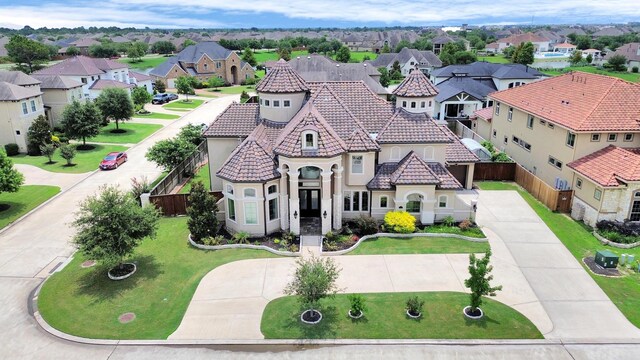 18111 Dockside Landing Dr, Cypress, TX 77433 - view of front of property featuring curved driveway, stucco siding, a residential view, and a tile roof