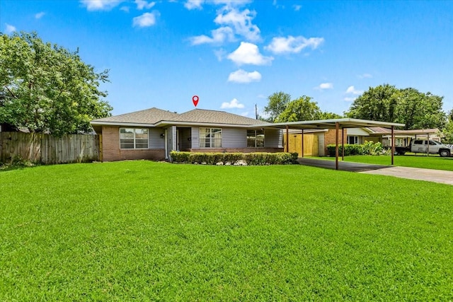 12322 Kitty Ln, Houston, TX 77015 - view of front of home featuring concrete driveway and a carport