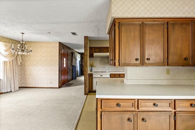 12322 Kitty Ln, Houston, TX 77015 - kitchen featuring wallpapered walls, a chandelier, light carpet, under cabinet range hood, and white oven