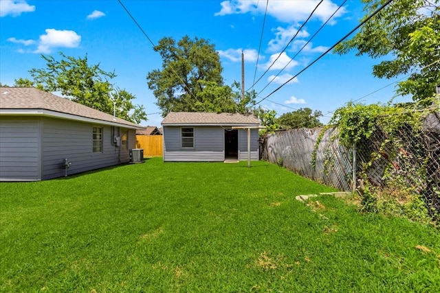 12322 Kitty Ln, Houston, TX 77015 - fenced backyard featuring an outbuilding