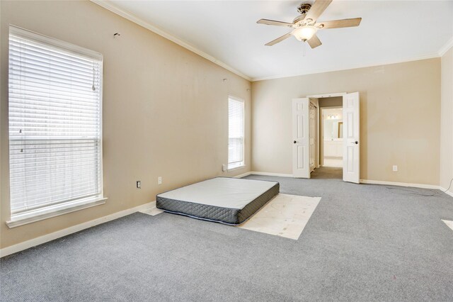 5208 Jolie Dr, Pearland, TX 77584 - carpeted bedroom with ornamental molding, baseboards, and ceiling fan