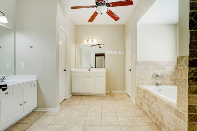 5208 Jolie Dr, Pearland, TX 77584 - bathroom featuring two vanities, a ceiling fan, a garden tub, and tile patterned floors