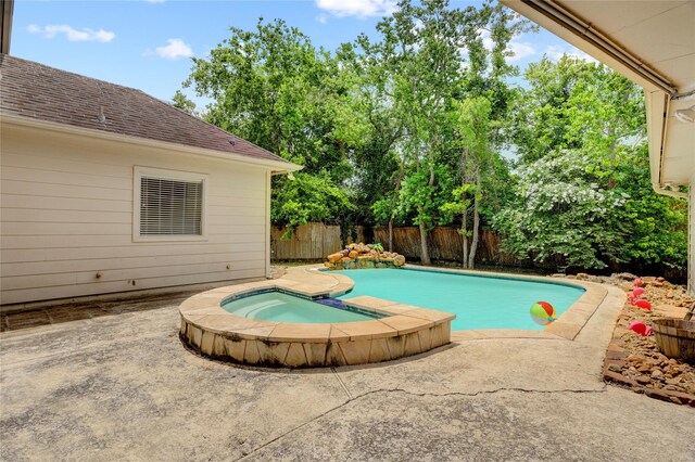 5208 Jolie Dr, Pearland, TX 77584 - view of swimming pool with a fenced backyard, a patio, and a pool with connected hot tub