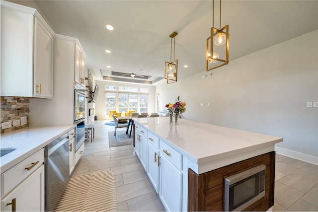 17107 Nulakeast Ct, Houston, TX 77044 - kitchen with stainless steel appliances, white cabinetry, light countertops, recessed lighting, and backsplash