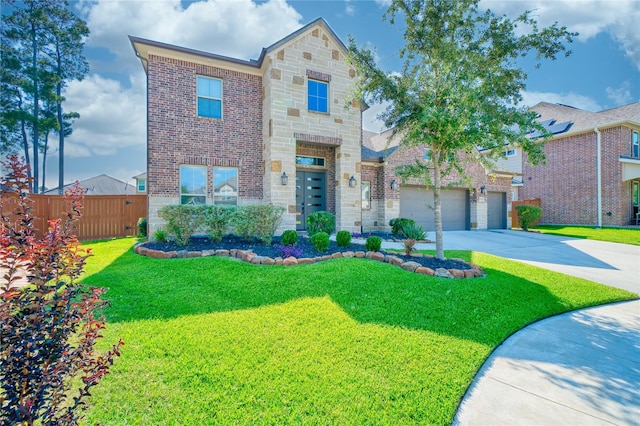17107 Nulakeast Ct, Houston, TX 77044 - view of front of home with stone siding, driveway, brick siding, and an attached garage