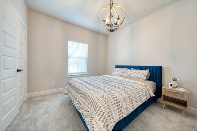 17107 Nulakeast Ct, Houston, TX 77044 - bedroom featuring carpet floors, a chandelier, and baseboards