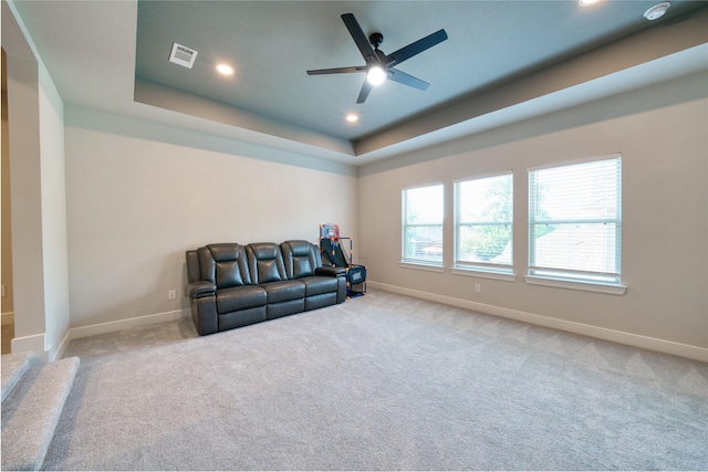 17107 Nulakeast Ct, Houston, TX 77044 - living area featuring baseboards, recessed lighting, a raised ceiling, ceiling fan, and carpet flooring