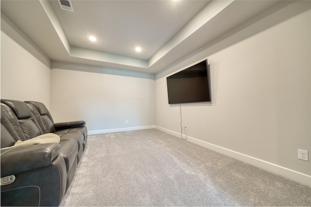 17107 Nulakeast Ct, Houston, TX 77044 - sitting room with baseboards, light colored carpet, a tray ceiling, and recessed lighting