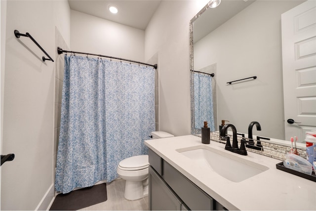 17107 Nulakeast Ct, Houston, TX 77044 - bathroom featuring vanity, toilet, curtained shower, tile patterned floors, and recessed lighting
