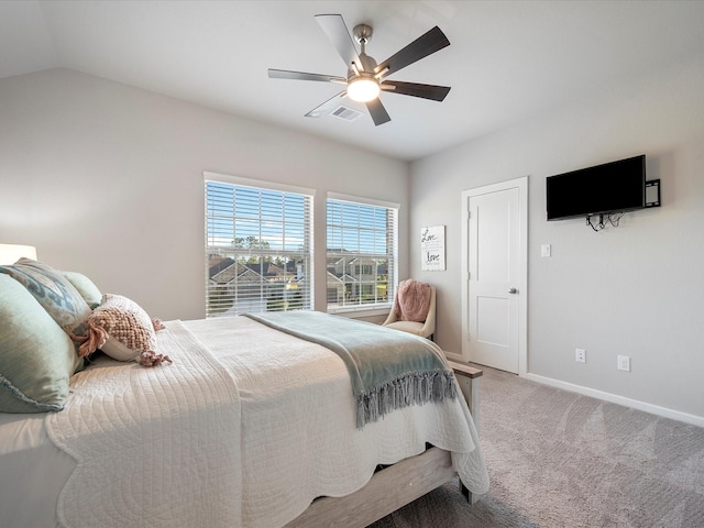 9715 Migrant Hawker Ct, Conroe, TX 77385 - carpeted bedroom with baseboards, a ceiling fan, and vaulted ceiling