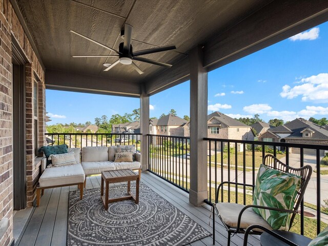 9715 Migrant Hawker Ct, Conroe, TX 77385 - deck with a residential view, ceiling fan, and an outdoor living space