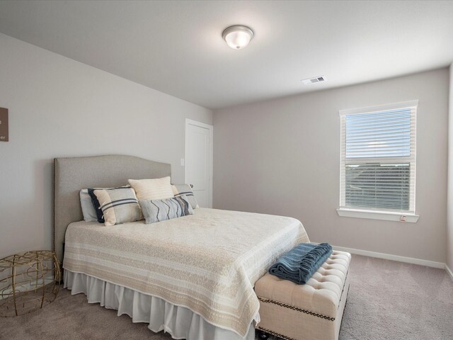9715 Migrant Hawker Ct, Conroe, TX 77385 - bedroom featuring carpet floors and baseboards