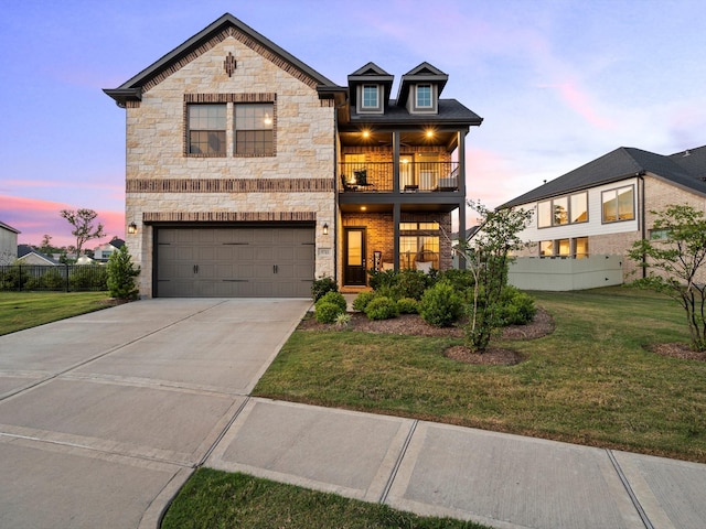 9715 Migrant Hawker Ct, Conroe, TX 77385 - view of front of home featuring a balcony, an attached garage, stone siding, and concrete driveway
